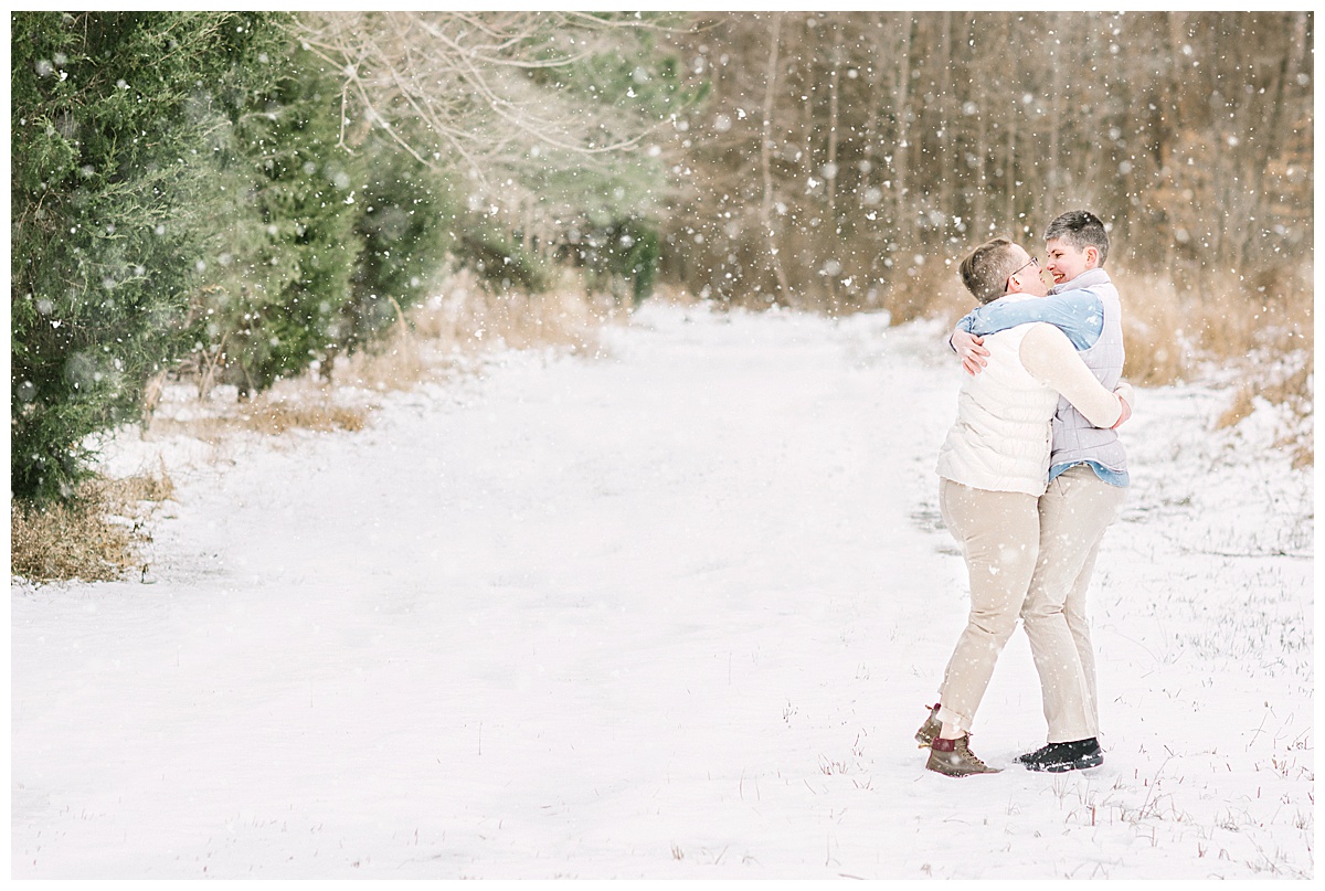 embracing couple in the snow