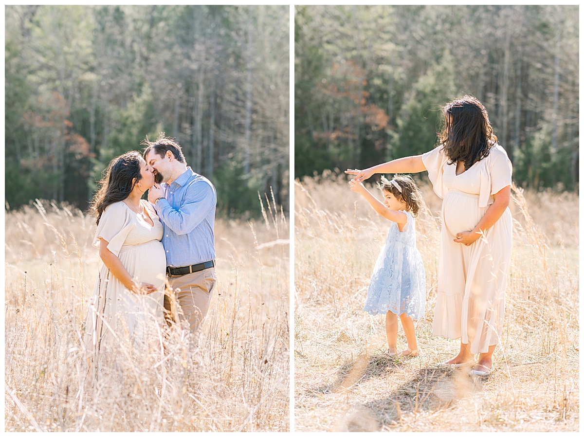 Mom to be twirling daughter and kissing husband in a field